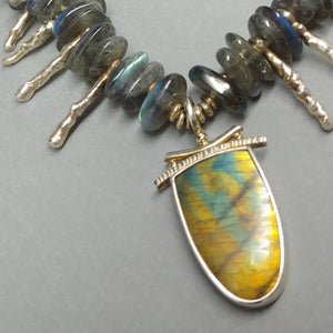 Spectrolite labradorite Sterling necklace by Judy Knose and Lori Braun. It is available at BNOX jewelry Studio in Pepin Wisconsin.